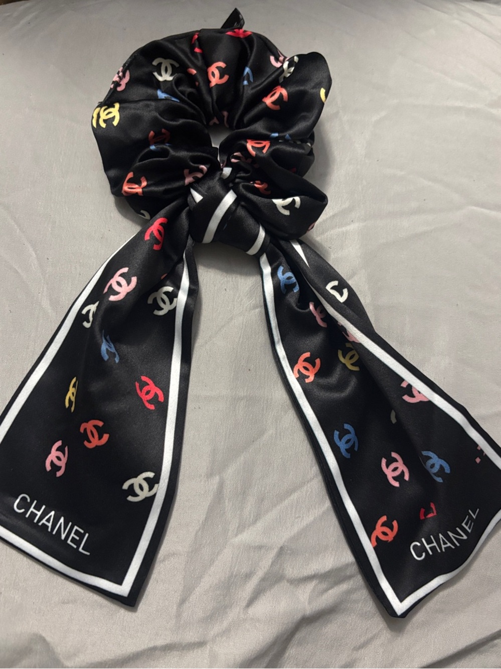 CHANEL Black Scrunchie with Multicolor CC Logo Tails